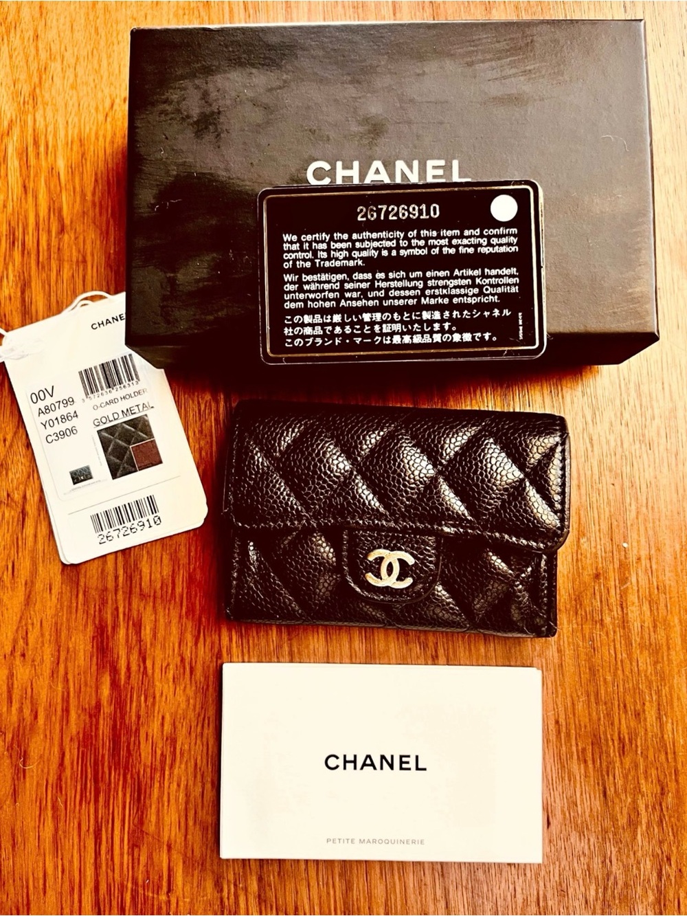CHANEL Black Quilted Caviar Mini Wallet with Gold CC